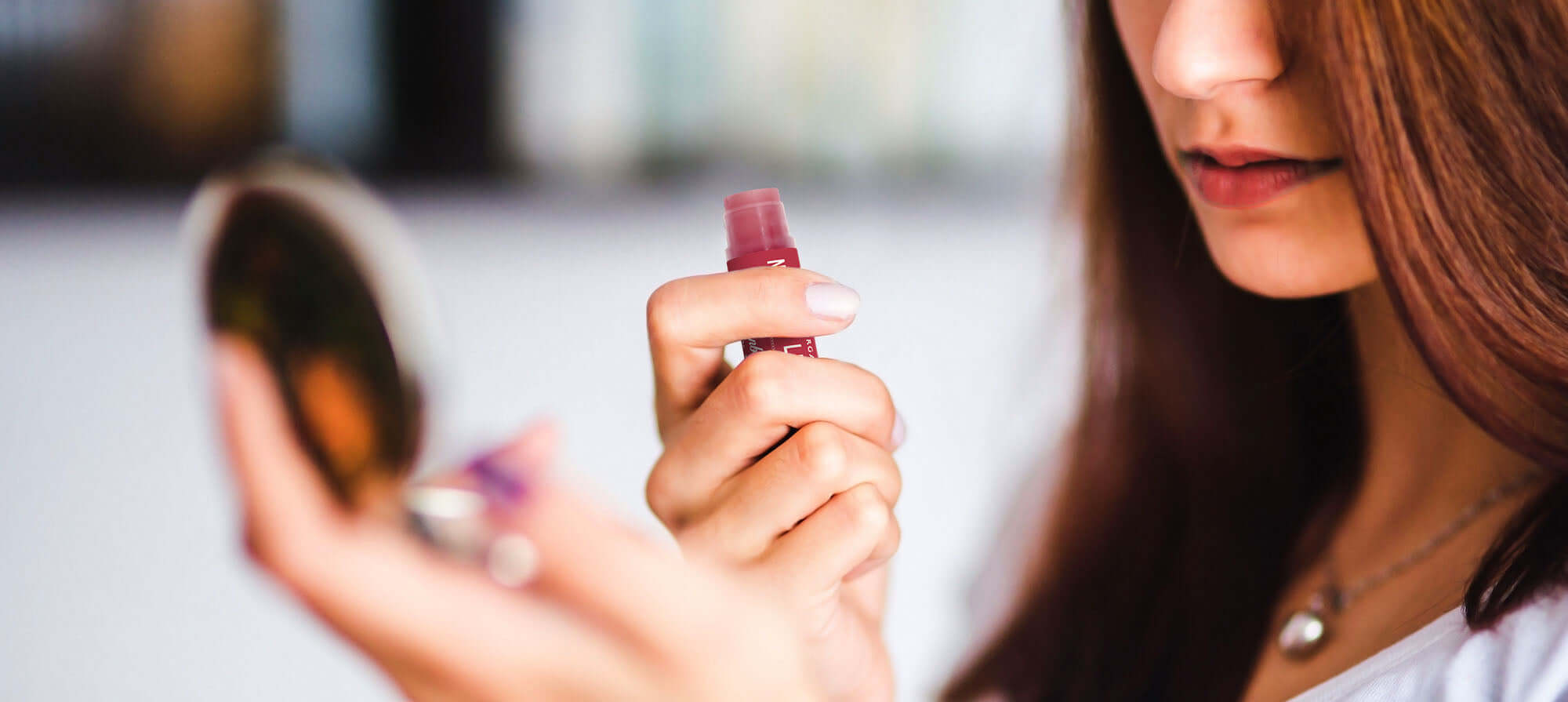 applying lip balm