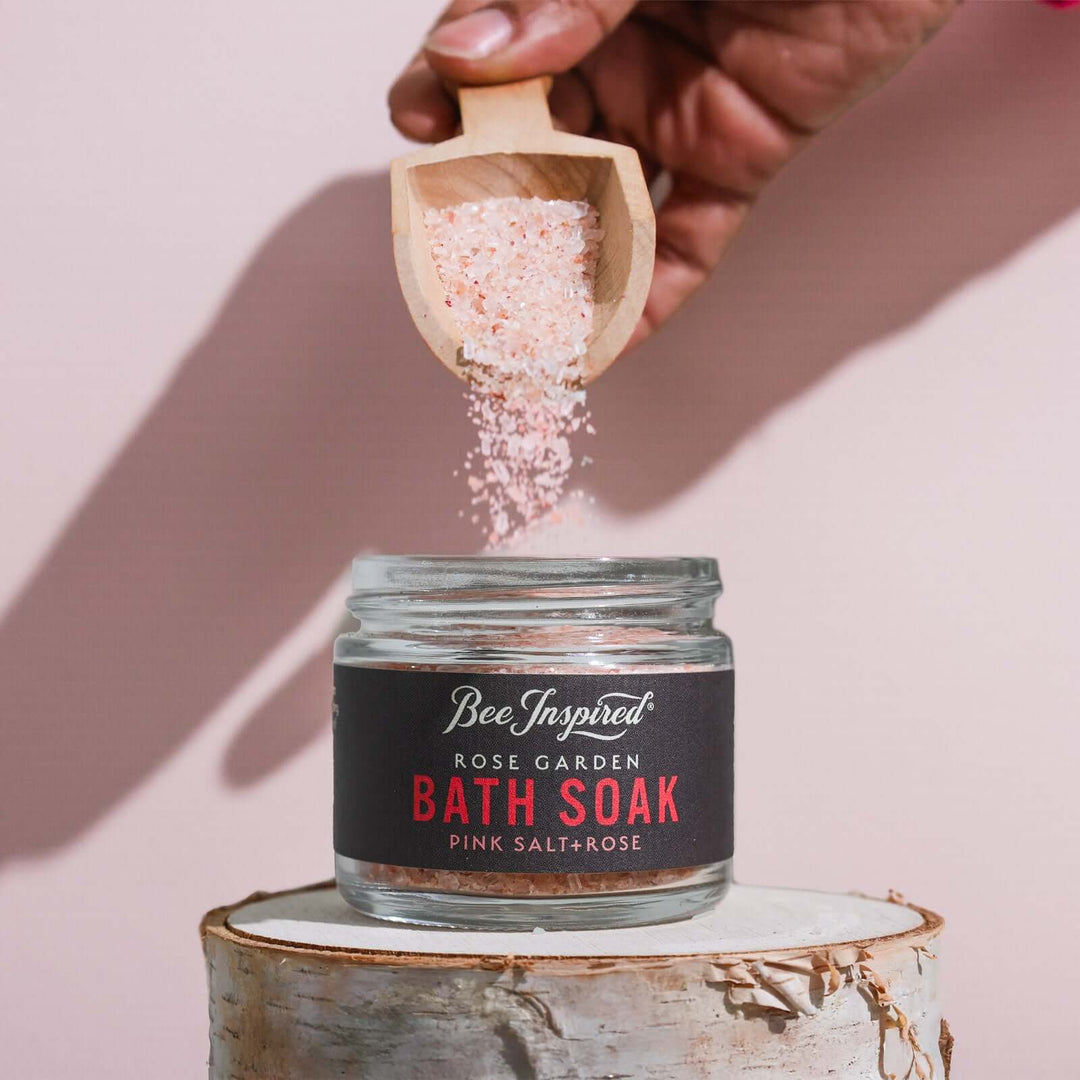 sprinkling Rose Garden bath soak into jar for petite set