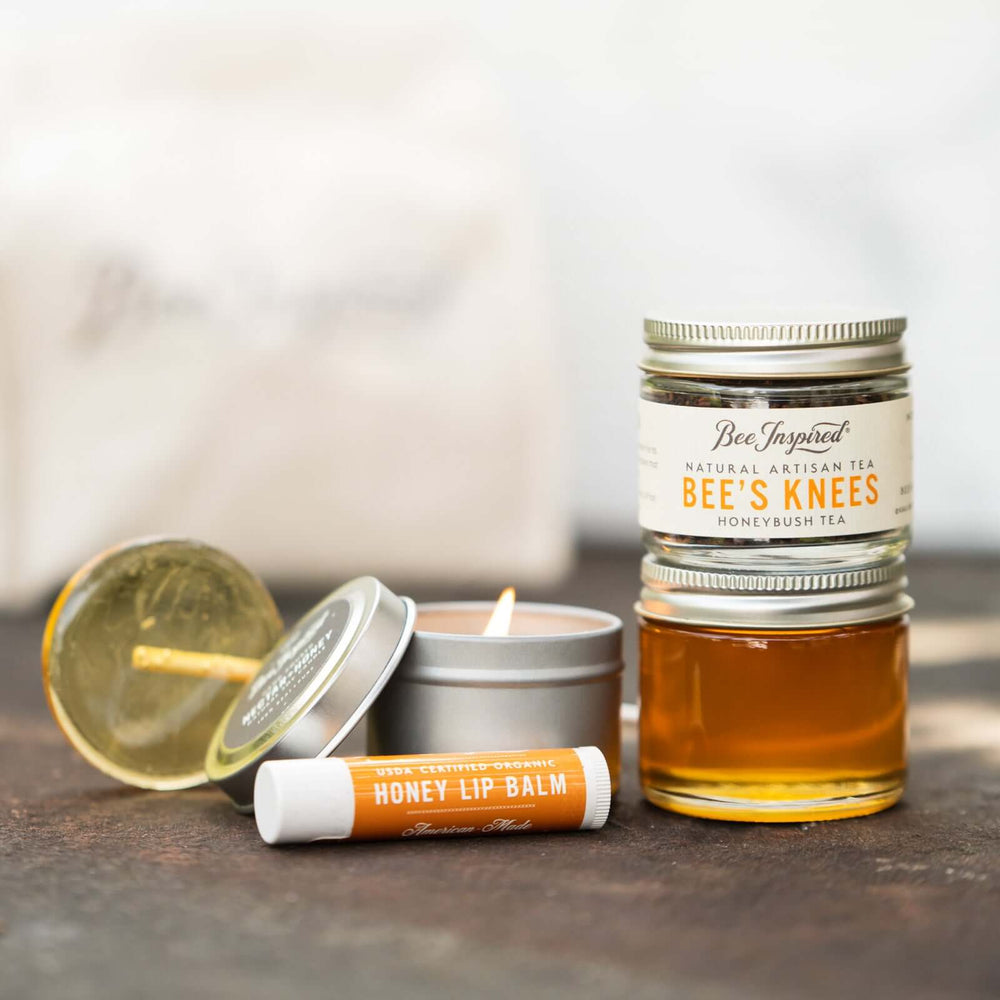 Bee's Knees gift set with white Bee Inspired bag in the background