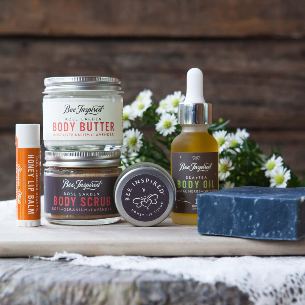 Gardener's Gift set in front of white flowers