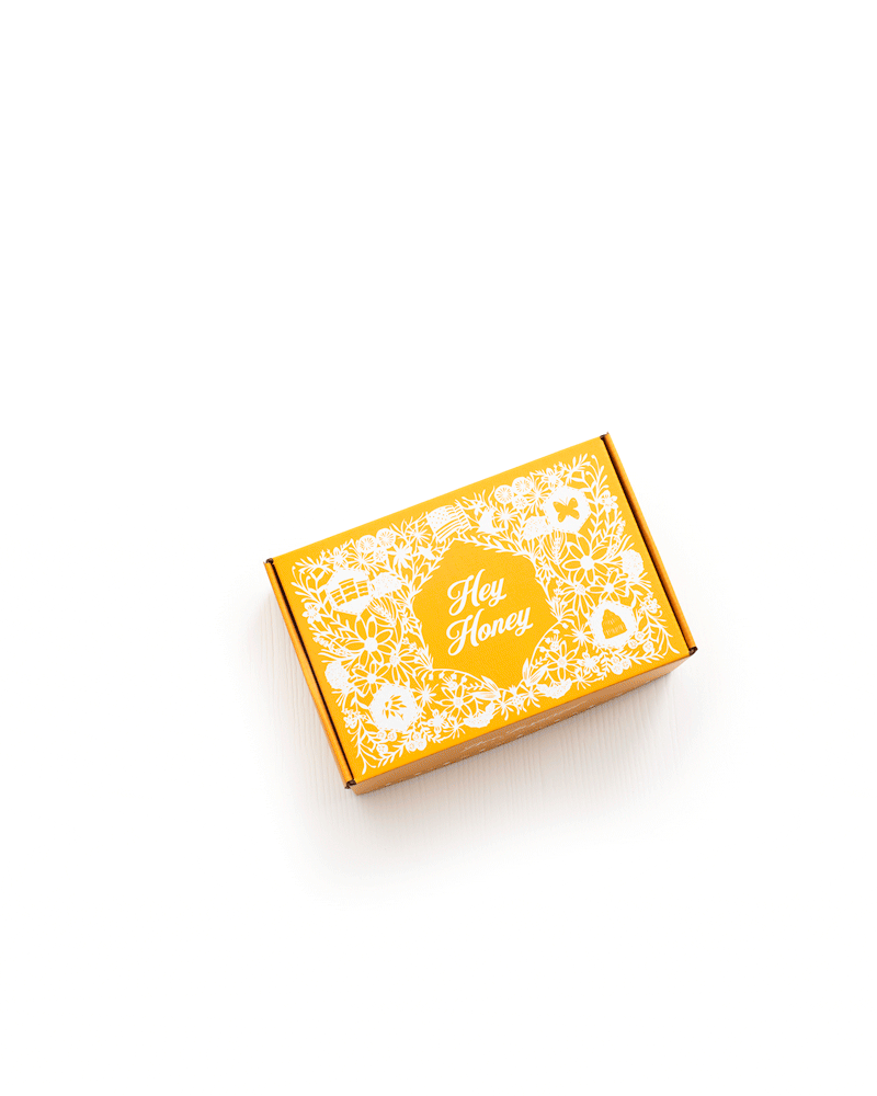 Short animation of empty Hey Honey box opening and closing