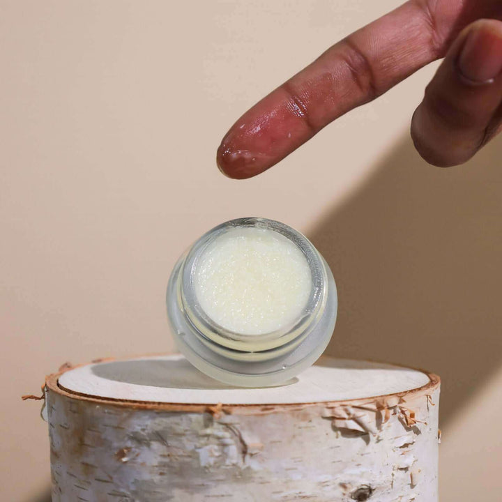 Lemon lip gloss ready to be applied