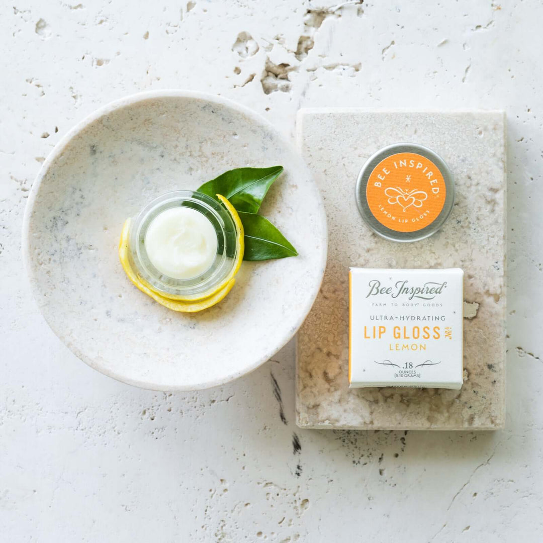 Lemon lip gloss on soap tray