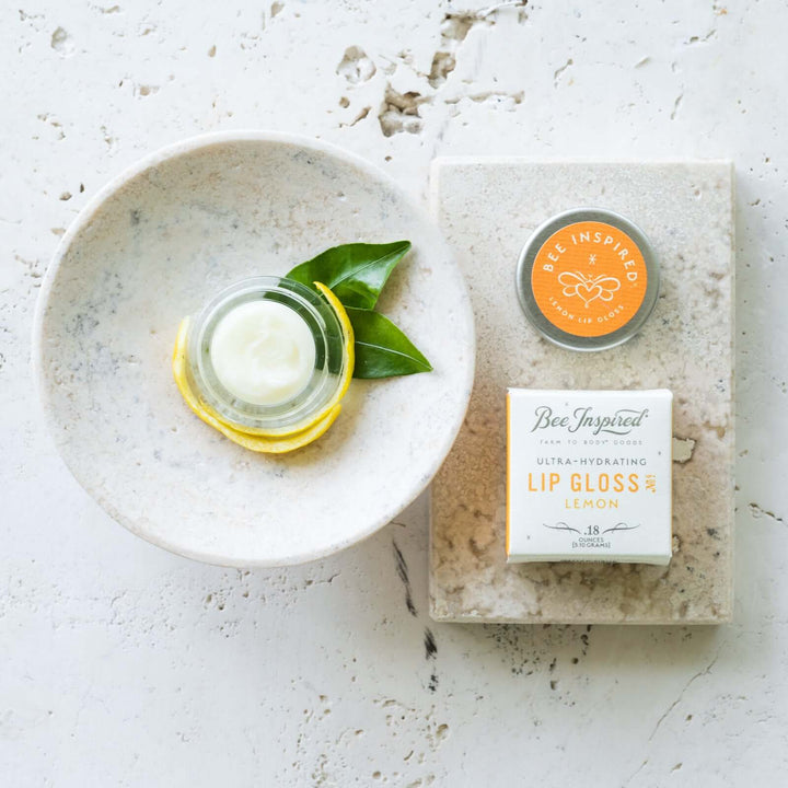 Lemon lip gloss on soap tray