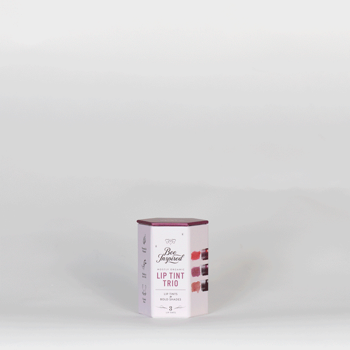 A short animation of Bee Inspired lip tint trio boxes being stacked on top of each other