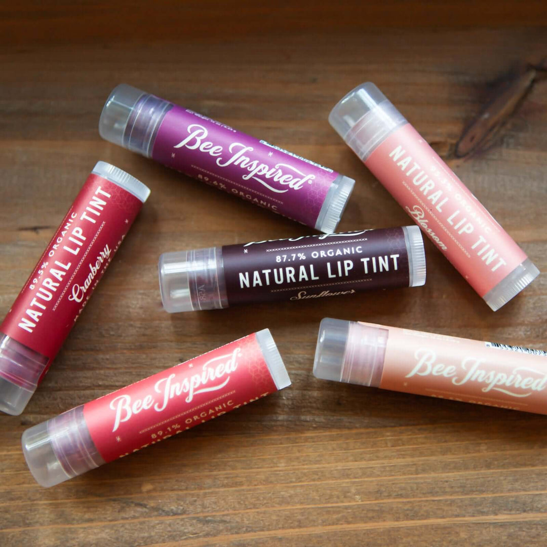 Lip tint 6-pack from bee inspired honey retail store in owings mills on wood
