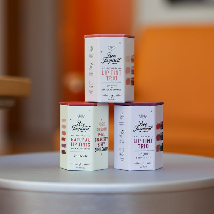 lip tint hex boxes stacked up on a table