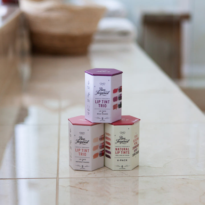 lip tint hex boxes stacked up on a bathroom counter
