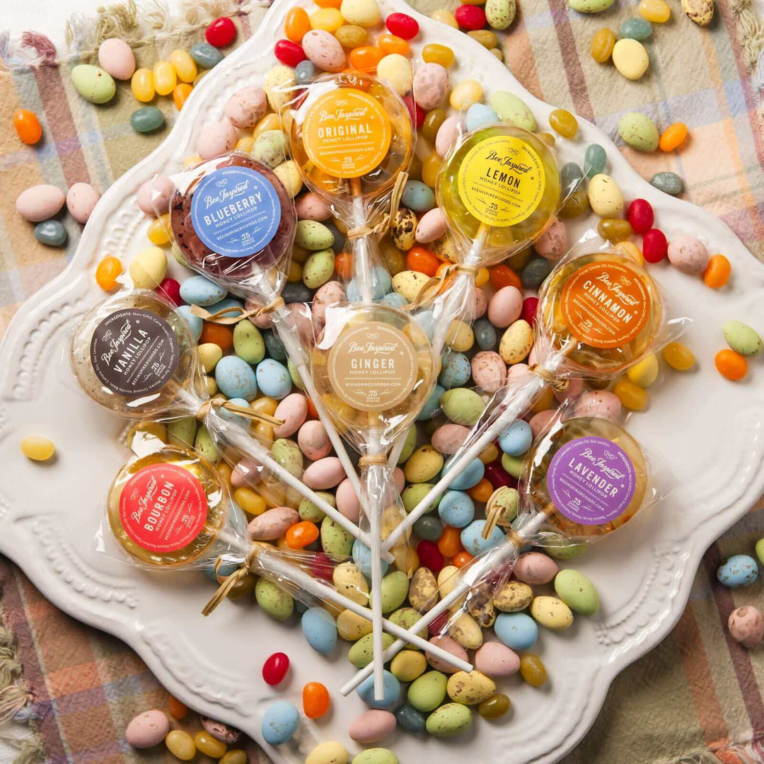 honey lollipops from bee inspired honey retail store in owings mills on top of a plate of easter candy