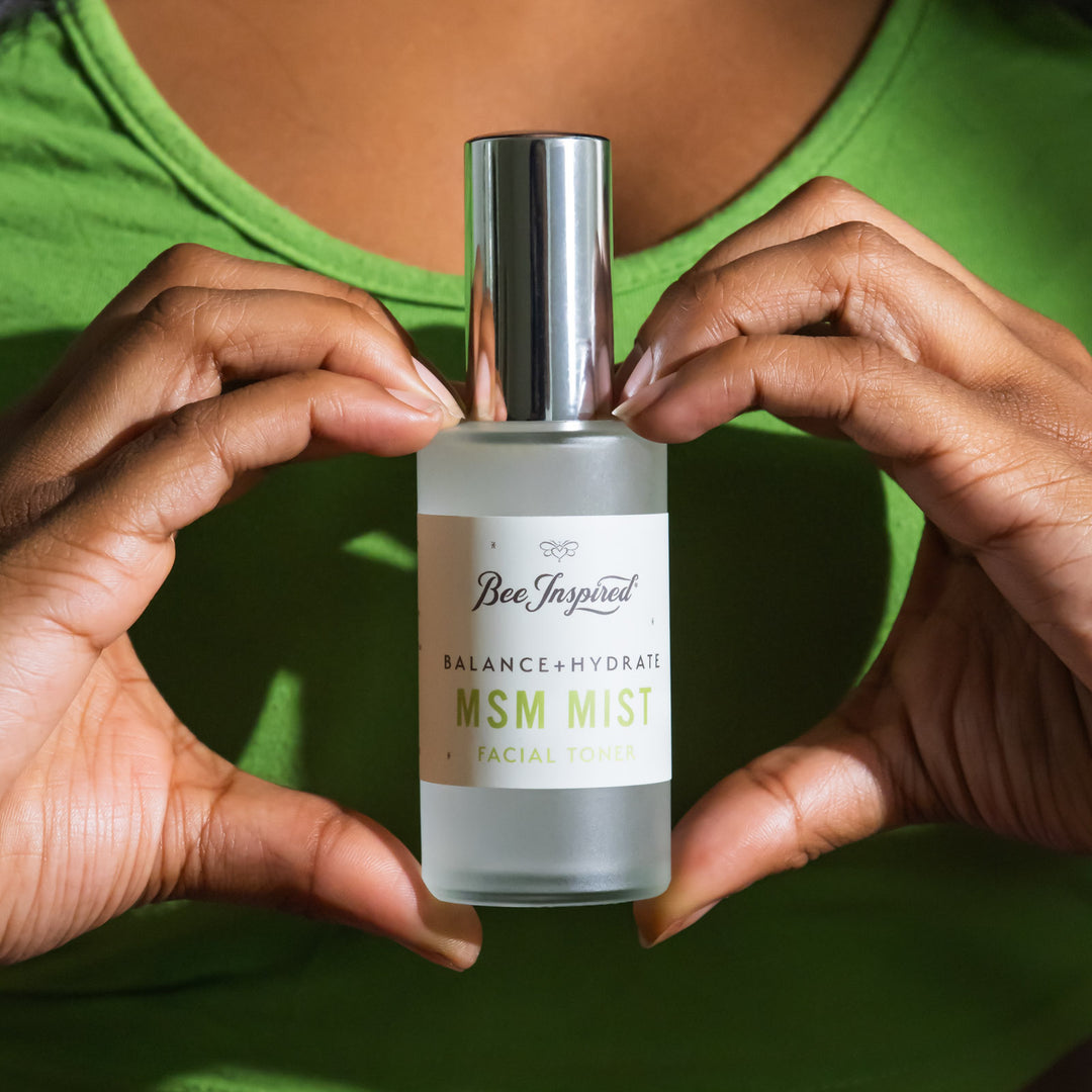 holding MSM Mist between heart-hands