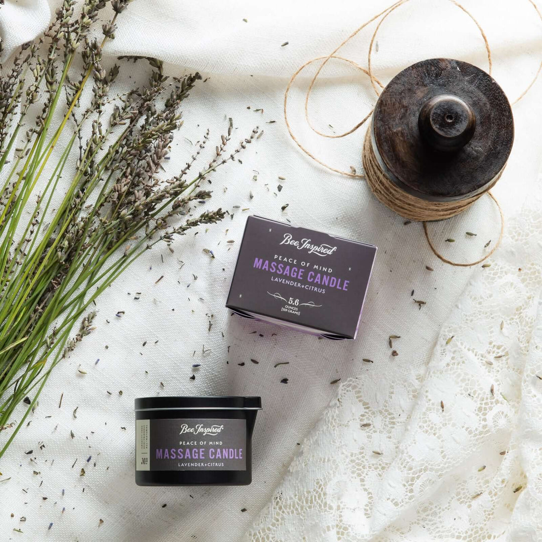 Peace of Mind massage candle and box flat lay with lavender
