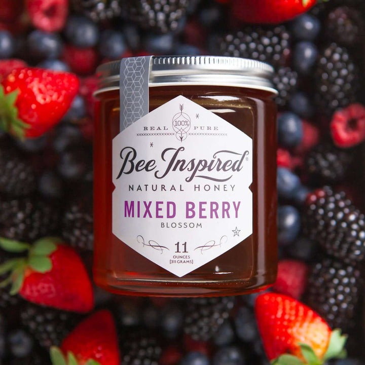 Mixed Berry honey flat lay on berries