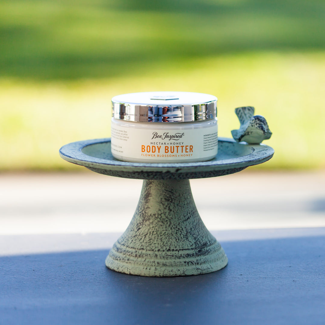 nectar and honey body butter on a bird bath
