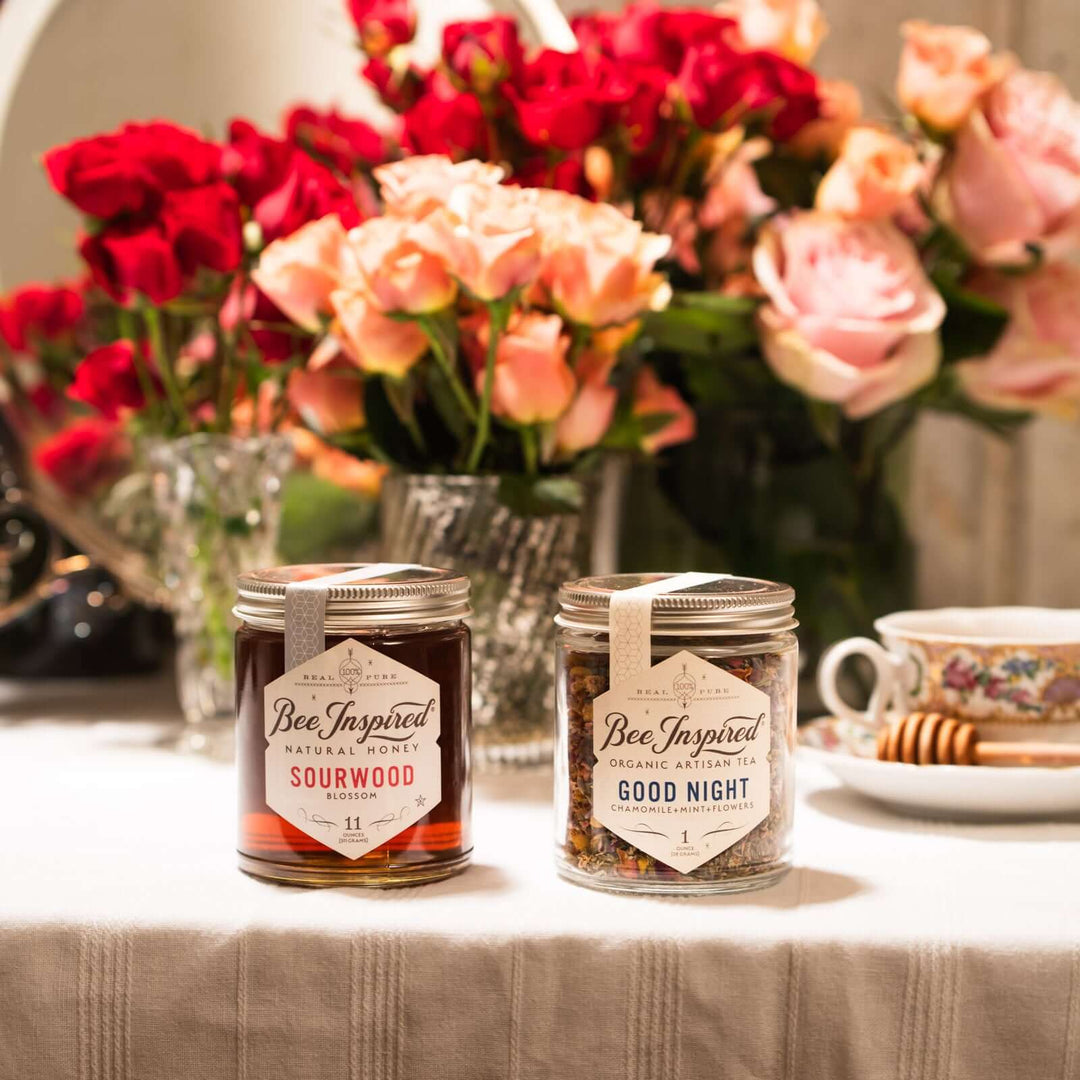 Sourwood honey and Good Night tea in front of rose bouquets
