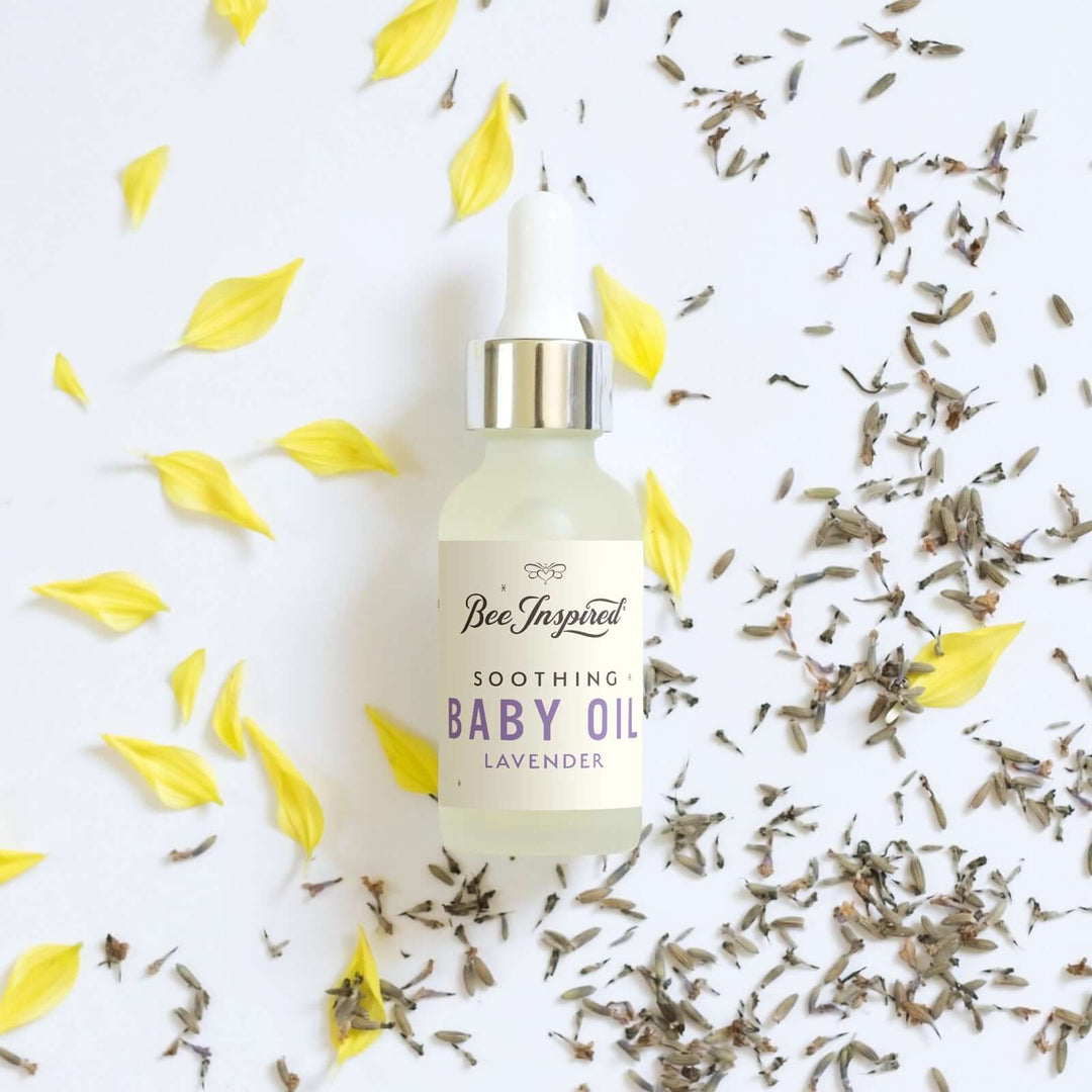 Lavender baby oil with dried flower petals and lavender