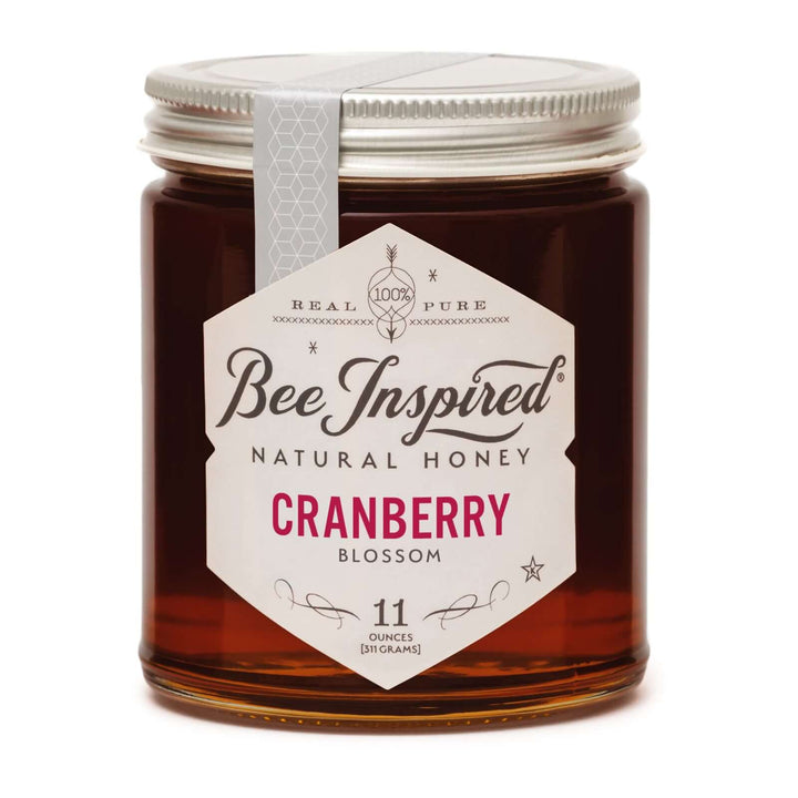 Cranberry honey by Bee Inspired Goods against white