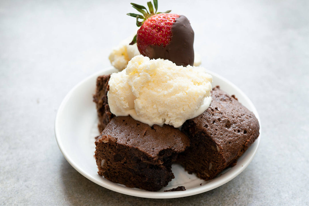 brownie sundae with ice cream and a strawberry on top