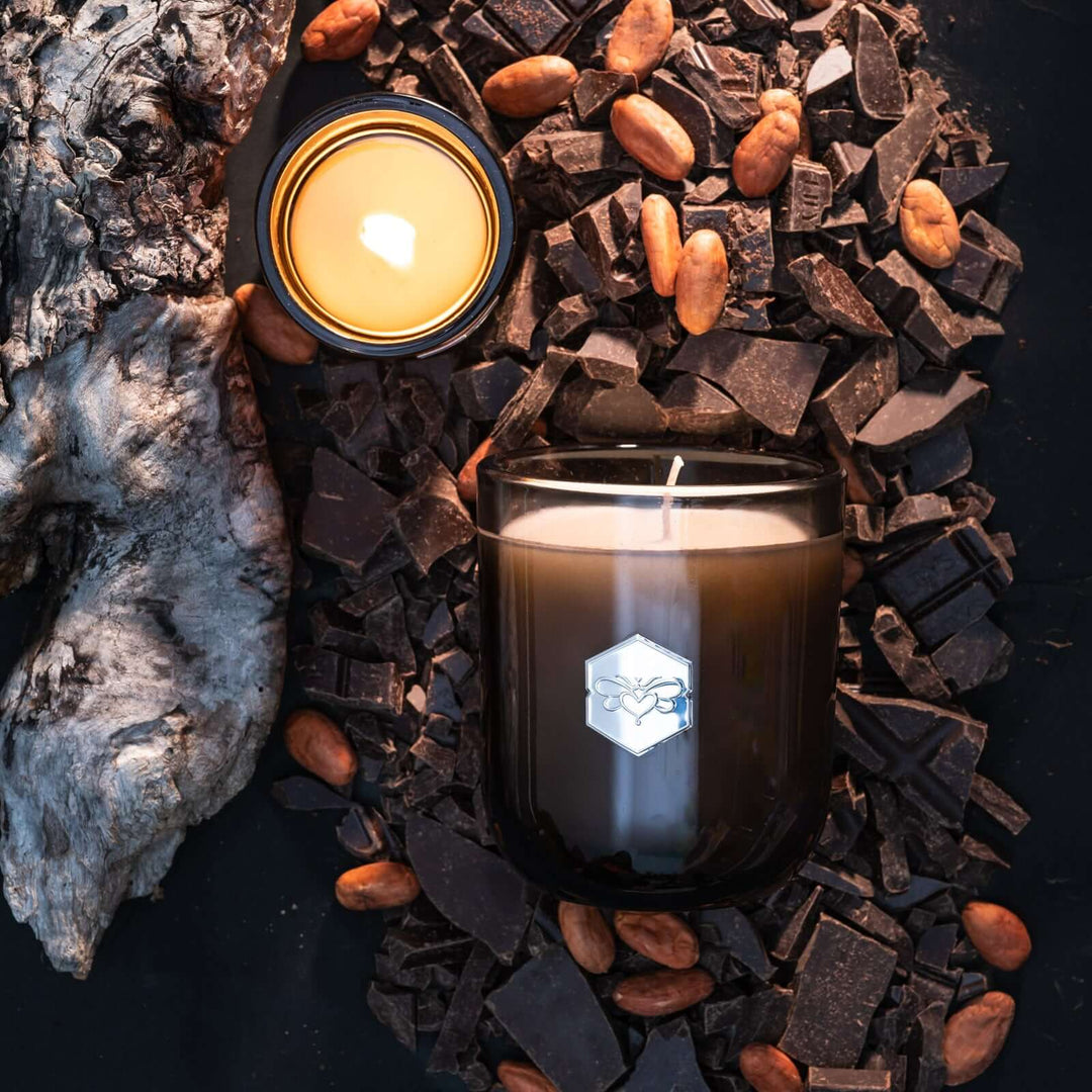 Haute Cocoa luxe candle flat lay with chocolate and almonds