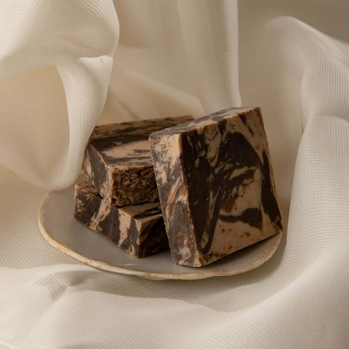 Coffee+Cream bar soaps stacked on fabric