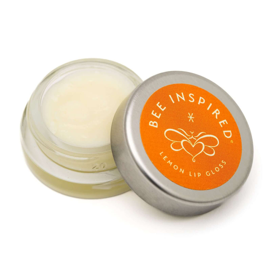 Lemon lip gloss on white