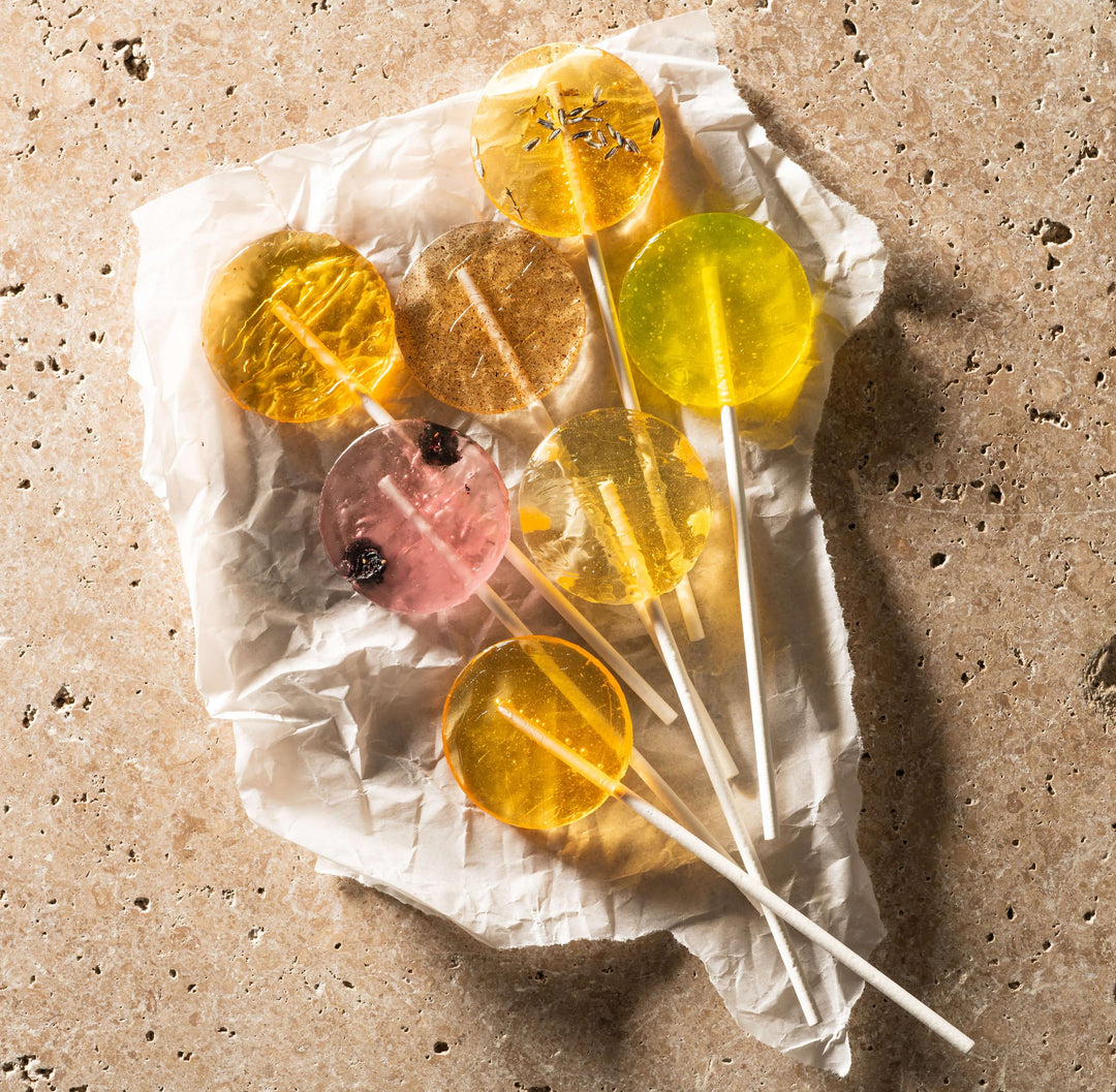 variety of honey lollipops on set
