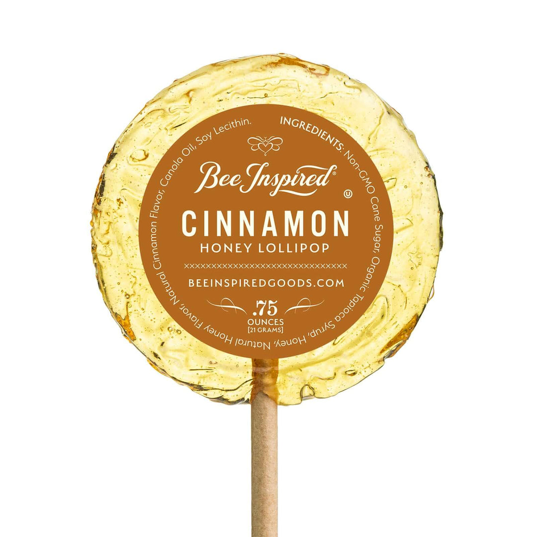 Cinnamon honey lollipop by Bee Inspired Goods against white