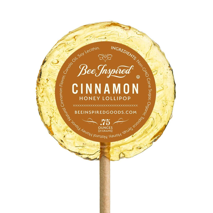 Cinnamon honey lollipop by Bee Inspired Goods against white