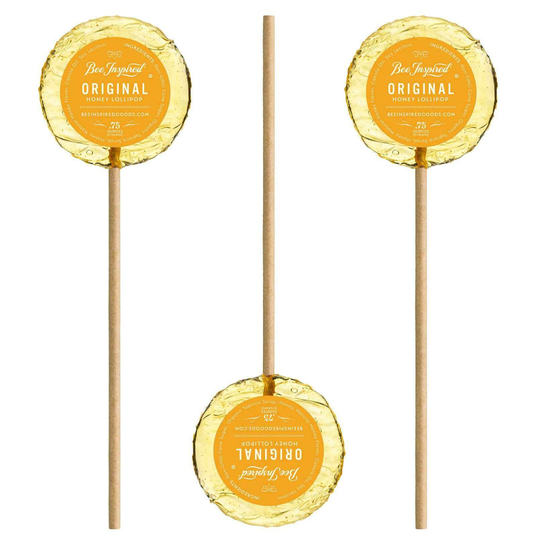 honey lollipops on white