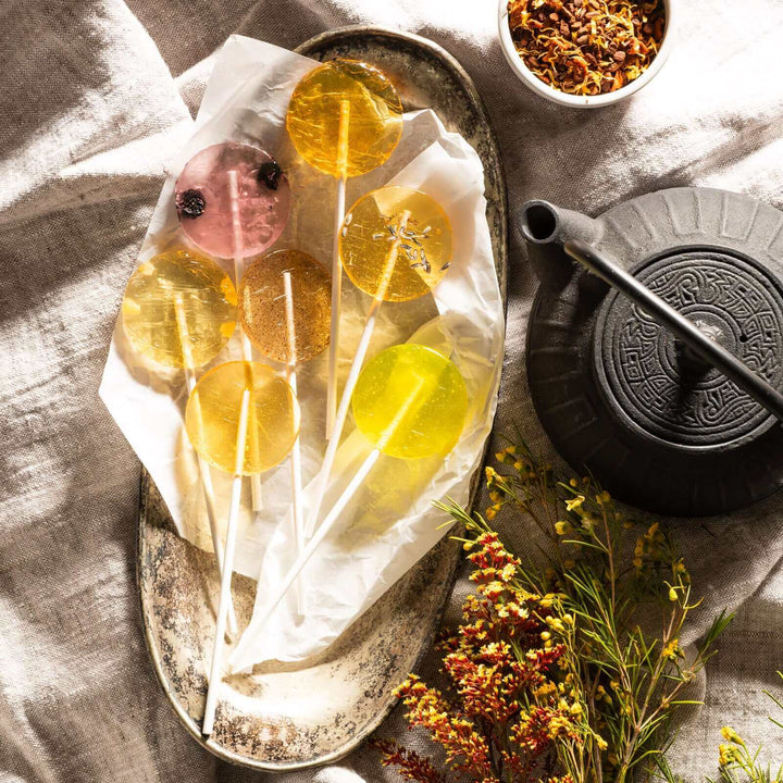honey lollipops from bee inspired honey retail store in owings mills on a tray
