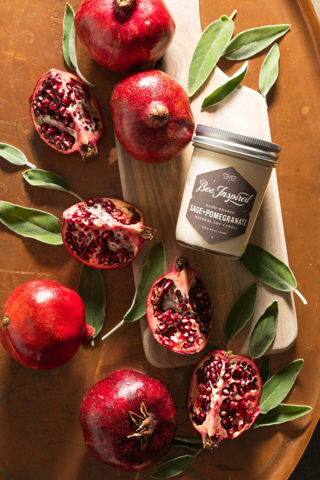 Sage+Pomegranate jelly jar candle flat lay with pomegranates