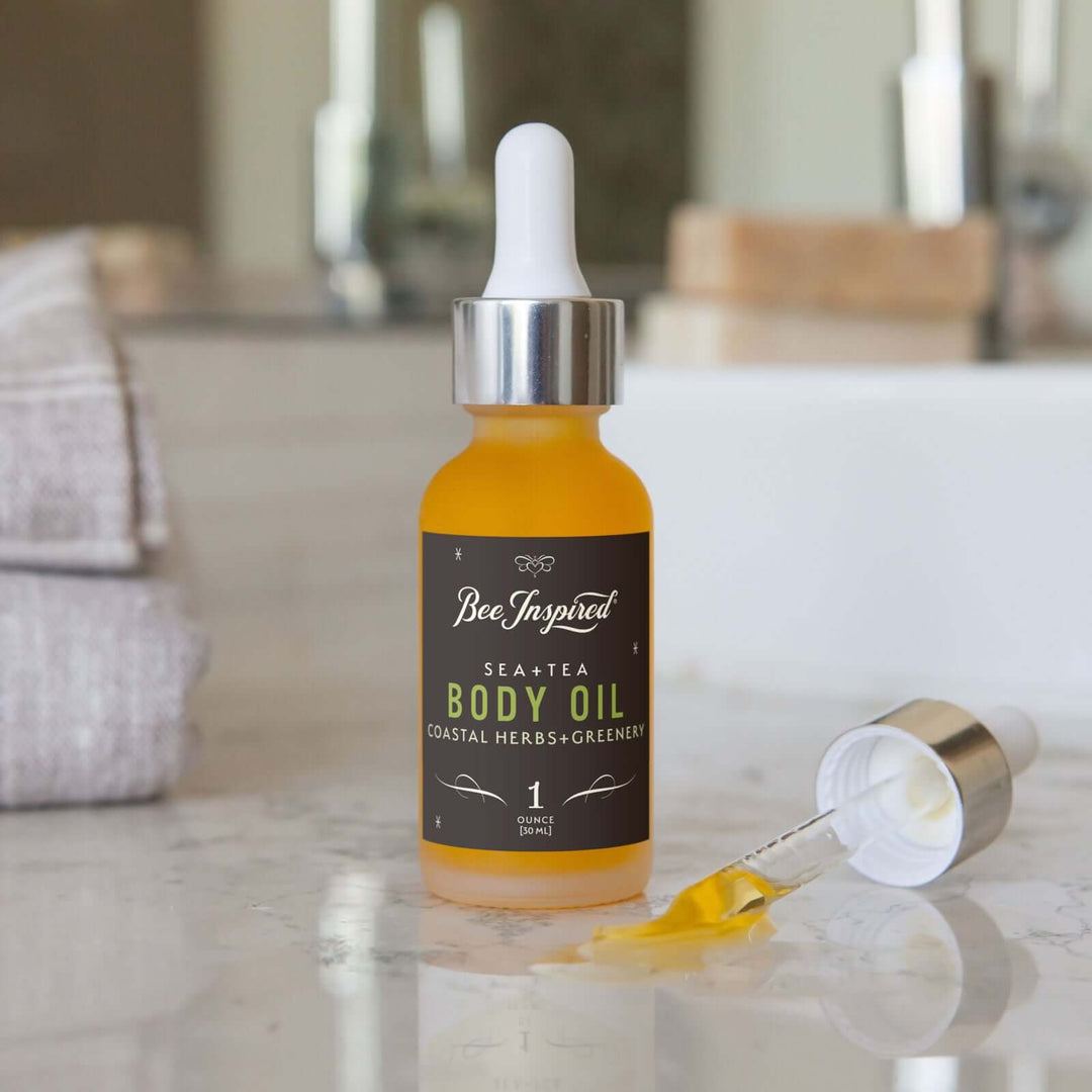 Sea+Tea body oil on bathroom counter