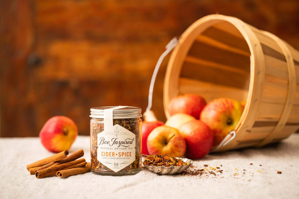 Cider and Spice Tea with cinnamon sticks and apples