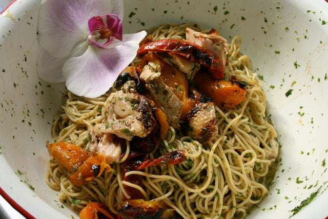 asian noodle salad with chicken in a bowl