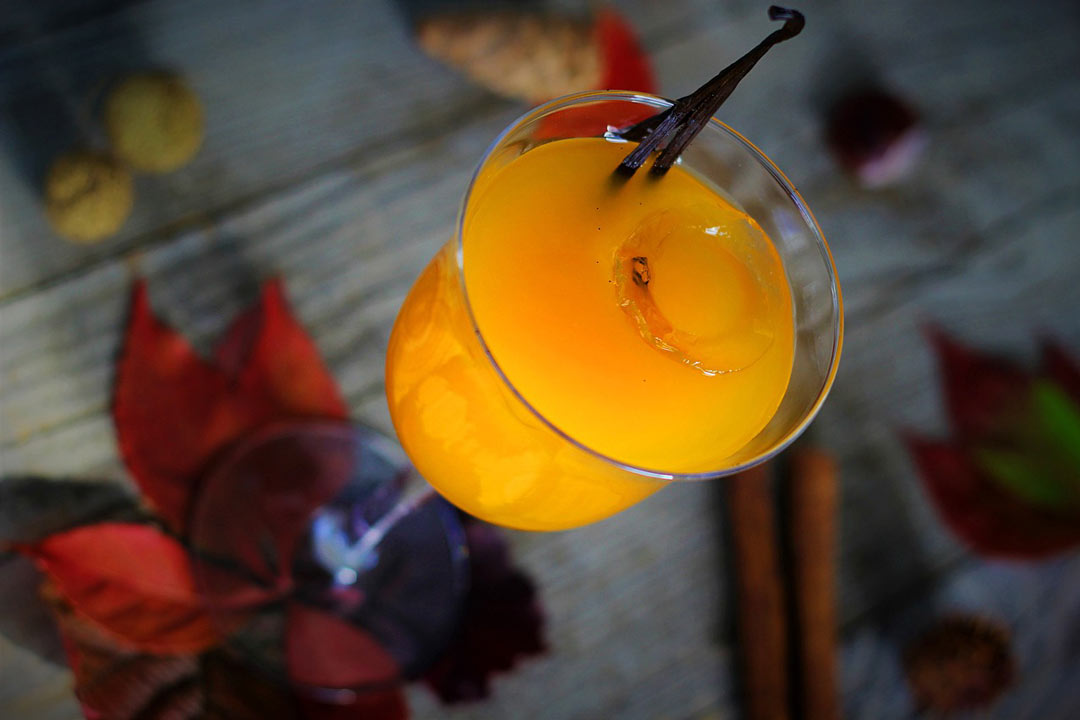 Pumpkin juice cocktail in a serving glass