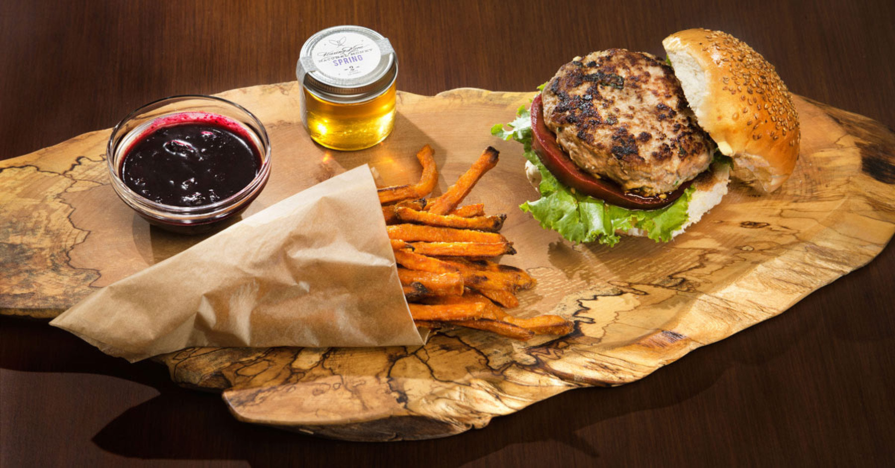 assembled feta turkey burger with honey and sweet potato fries