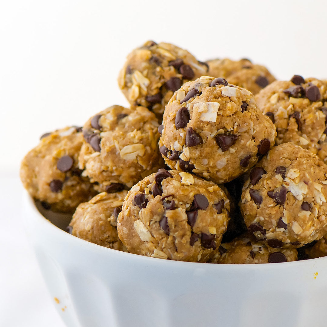 honey energy balls in a white bowl
