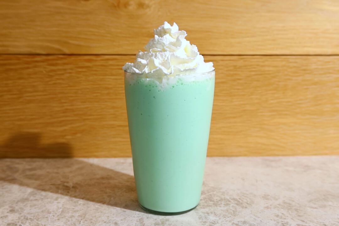 homemade shamrock shake with whipped cream