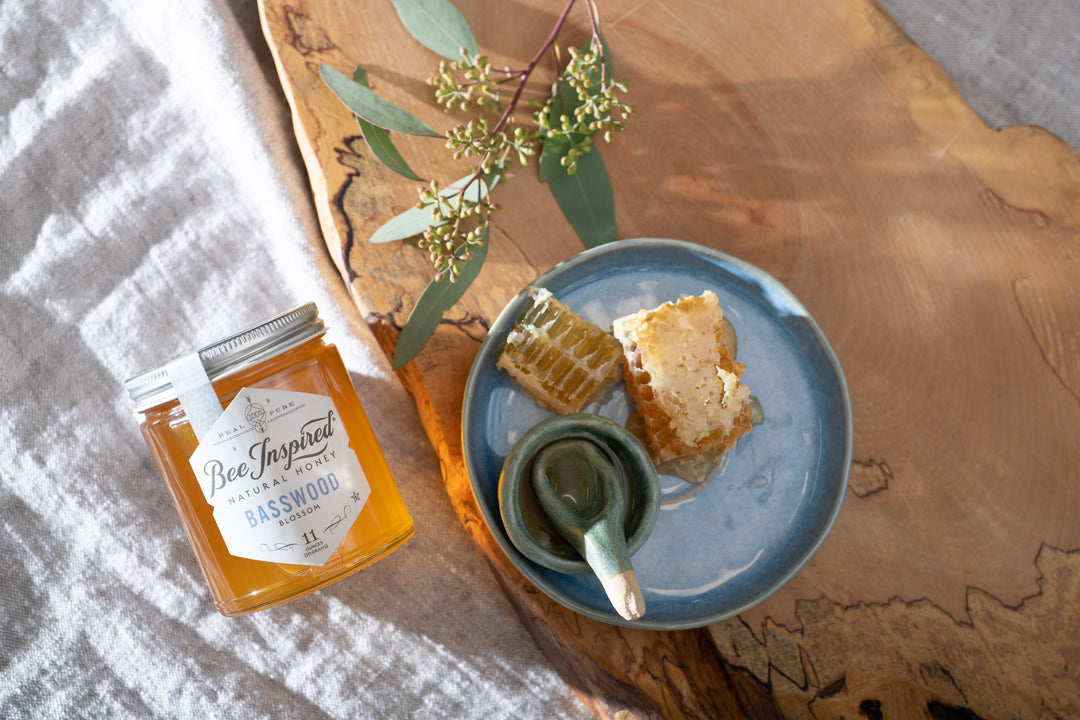 basswood honey from bee inspired honey retail store in owings mills on linen with wood