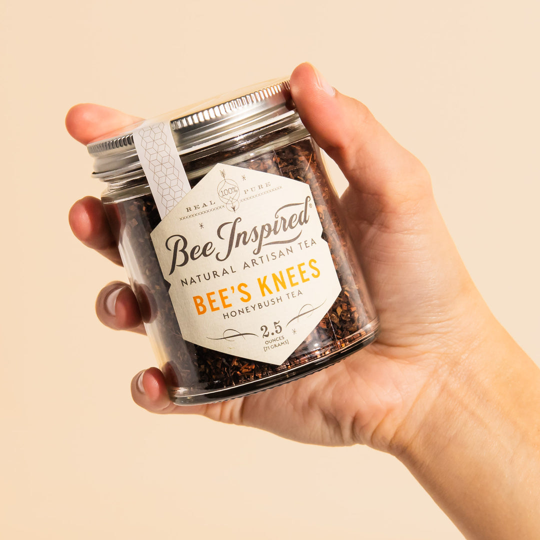 hand holding bee's knees honeybush tea