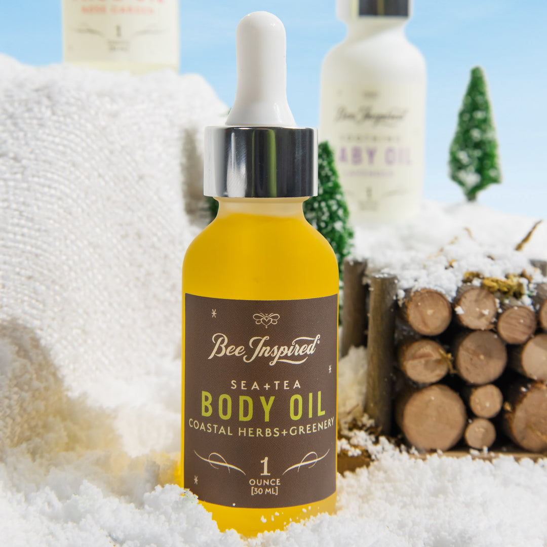 sea and tea body oil in a winter setting