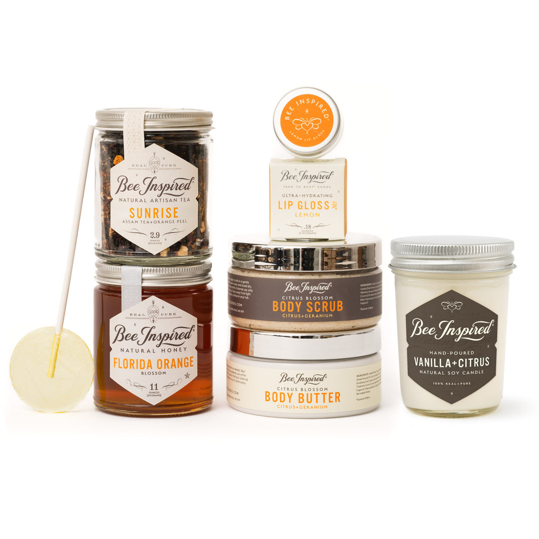 Collection of Bee Inspired skincare and wellness products on a white background