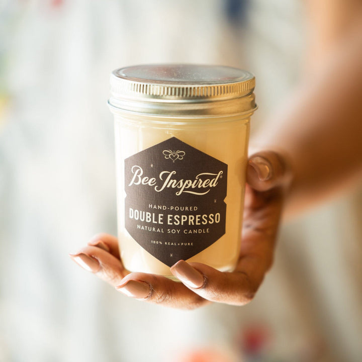 double espresso soy candle in hand