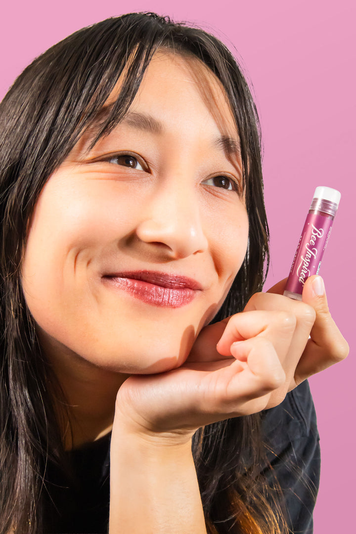 holding Berry lip tint