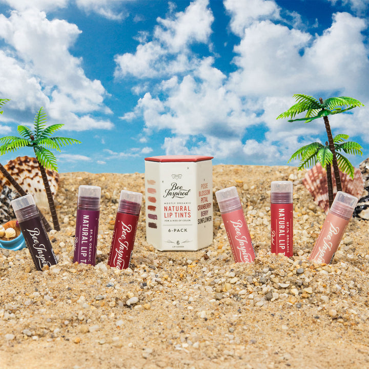 Natural Lip Tint 6-pack on a beach scene