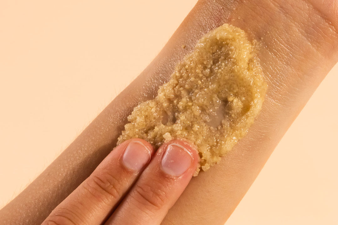 using Nectar+Honey body scrub on arm