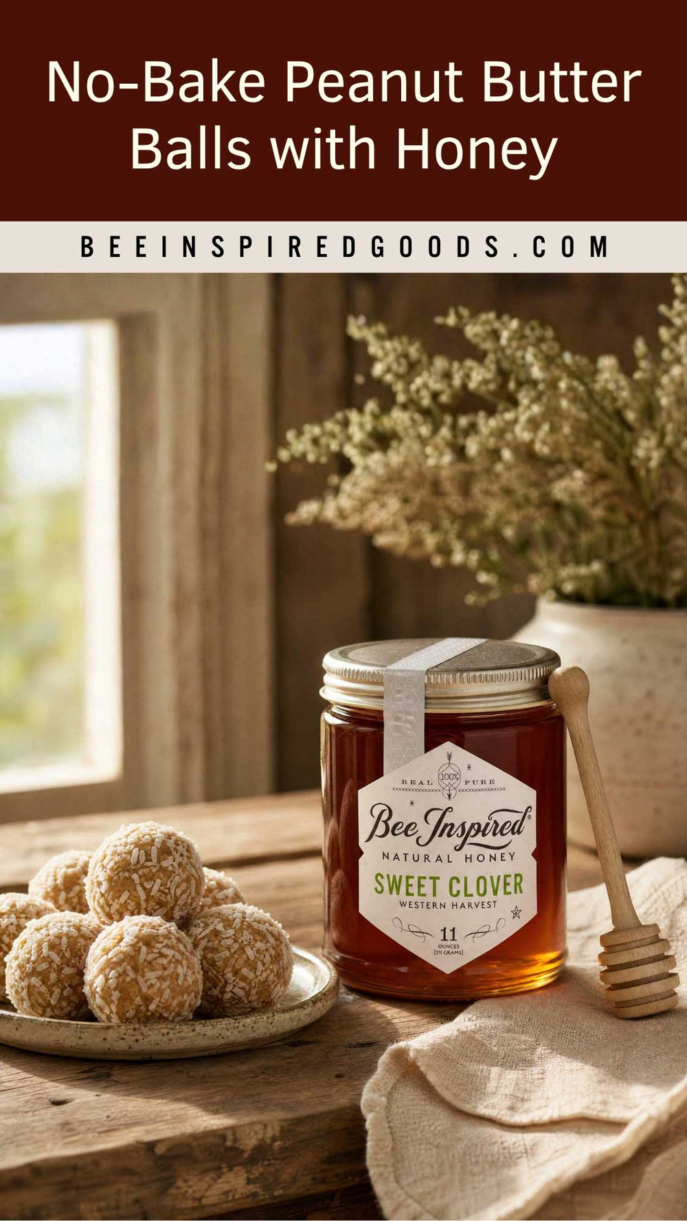 A jar of Bee Inspired Natural Honey Sweet Clover peanut butter balls are displayed on a rustic wooden table next to a plate of coated peanut butter balls, a wooden honey dipper, and dried flowers in a vase. The top of the image features a dark brown banner with the text 'No-Bake Peanut Butter Balls with Honey' and 'BEEINSPIREDGOODS.