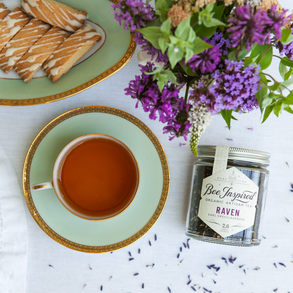 Raven Earl Grey Tea with Lavender at high tea with biscuits and china and flowers