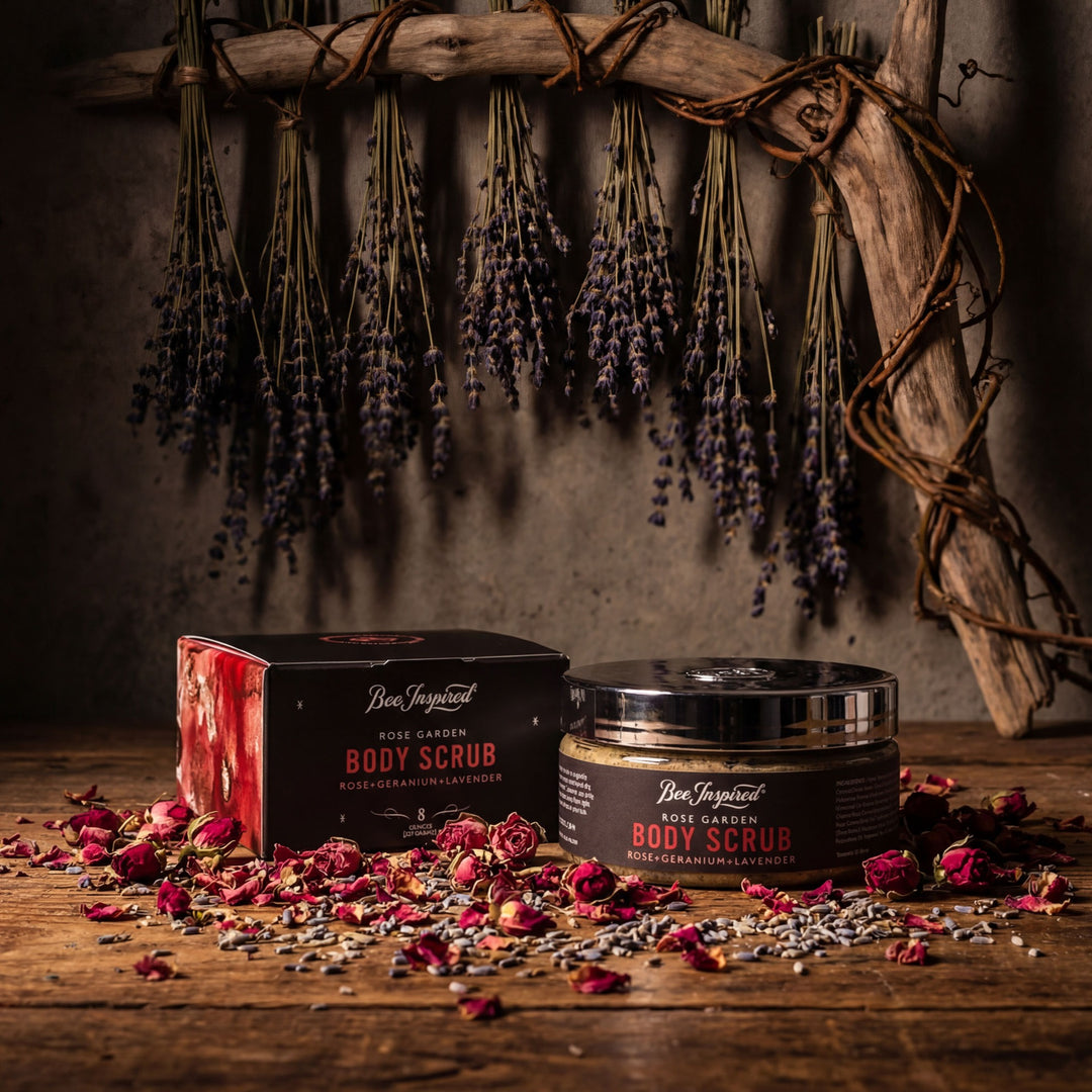 Body scrub packaging with lavender and rose petals on a wooden surface
