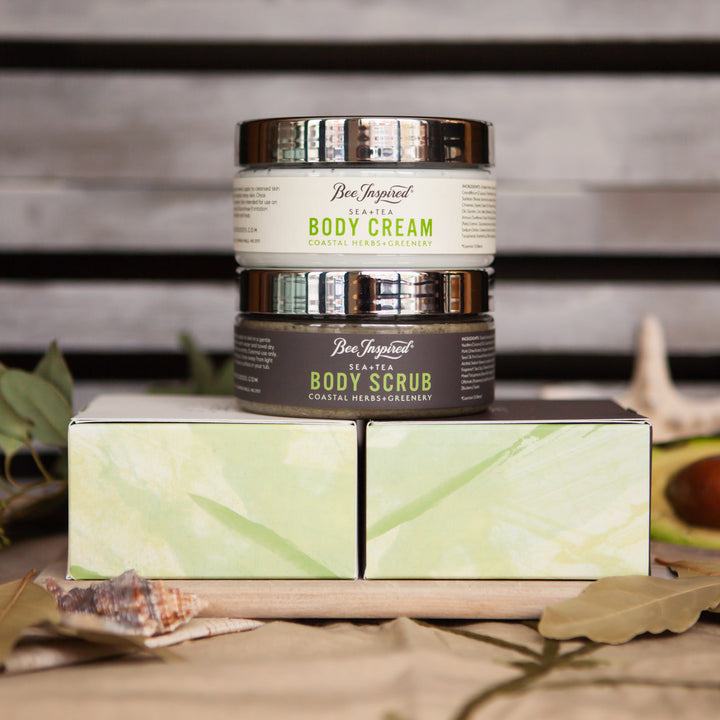 Sea+Tea cream and scrub duo on boxes against wood 