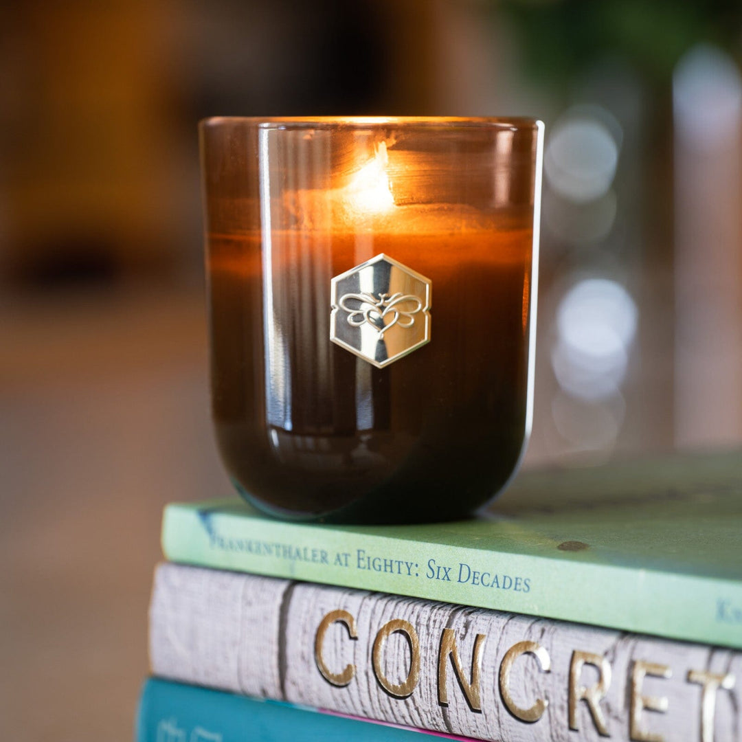 French Lavender Luxe Candle on books